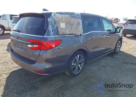 2022 Honda Odyssey Touring z USA, uszkodzony, nr VIN 5FNRL6H85NB018305